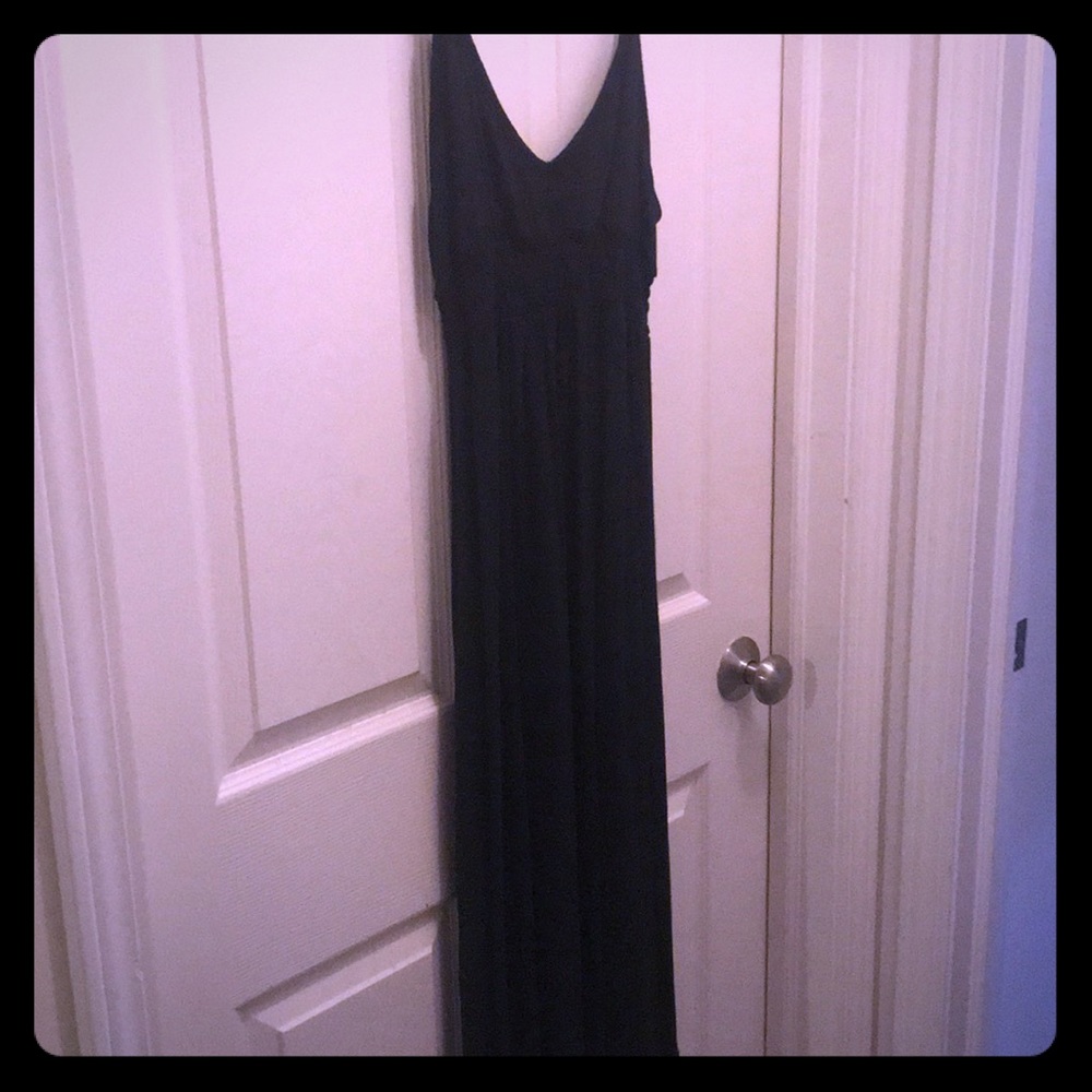 Black floor length maternity dress.